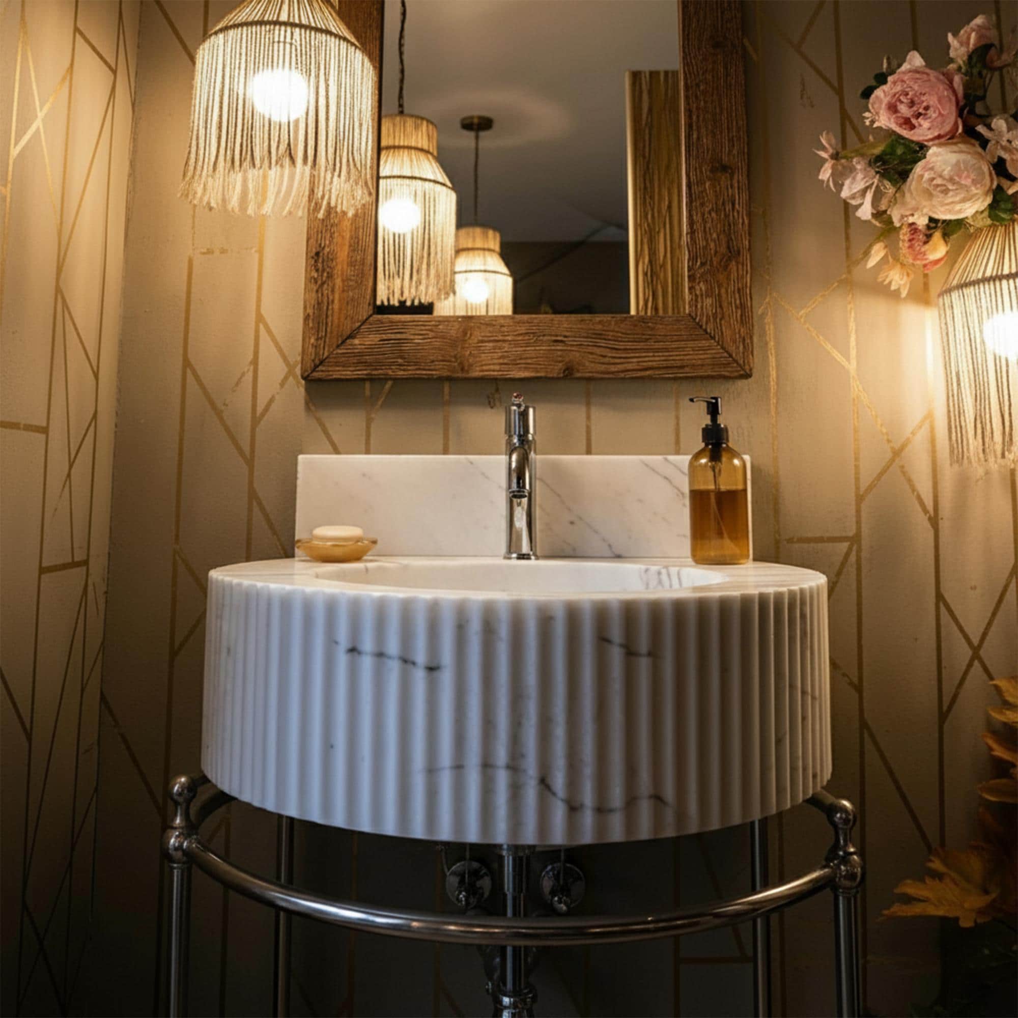 This hand-carved round marble sink brings timeless Carrara charm to a designer bathroom with artful sophistication.